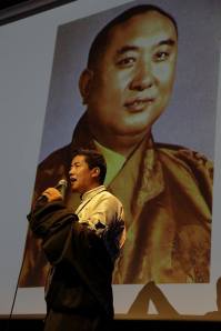 Palden sings a song in praise of the Tenth Panchen Lama
